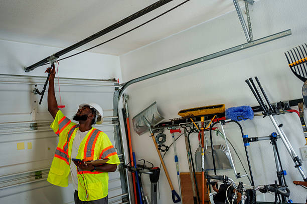 Professional Garage Door Panel Replacement technician working in Hillside Lake, NY